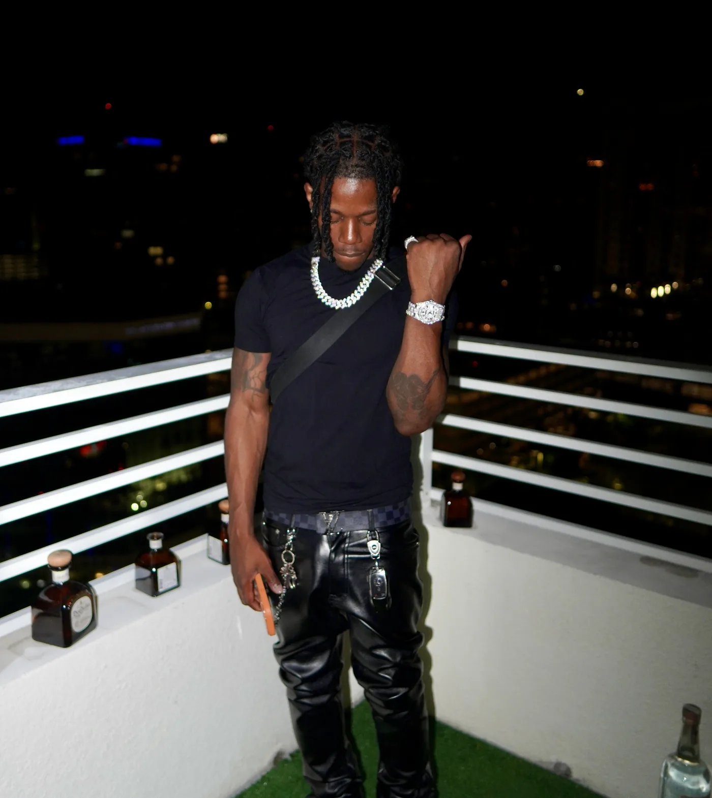 Playboy Pressure on a Fort Lauderdale rooftop at night